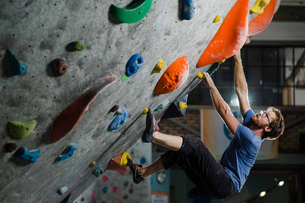 man in rock climbing trousers