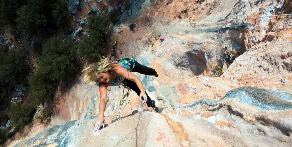 woman lead climbing falling