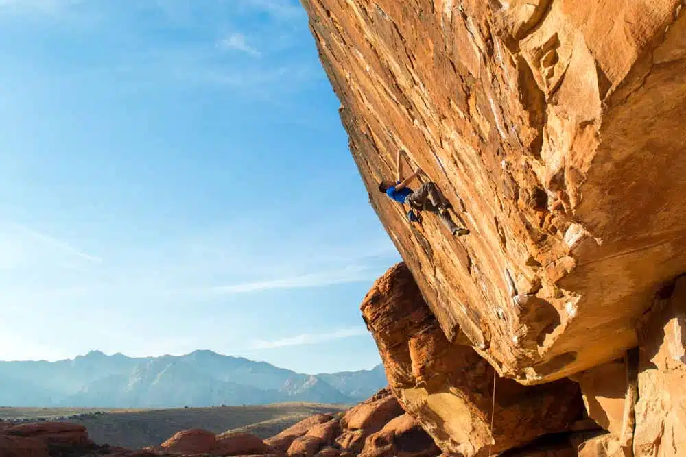 sport climber on steep wall