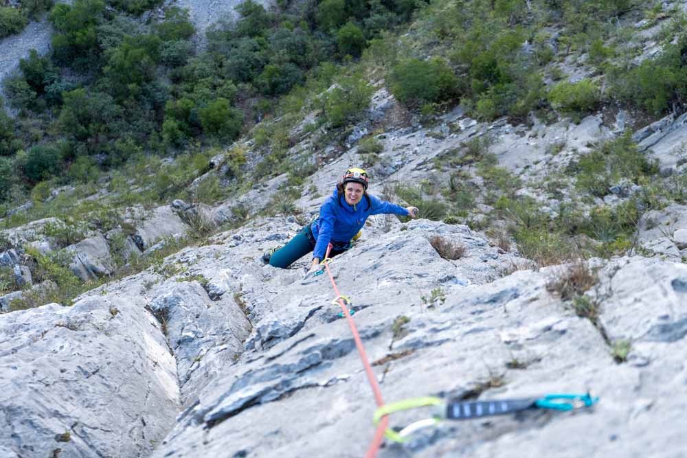 woman following on multipitch climb