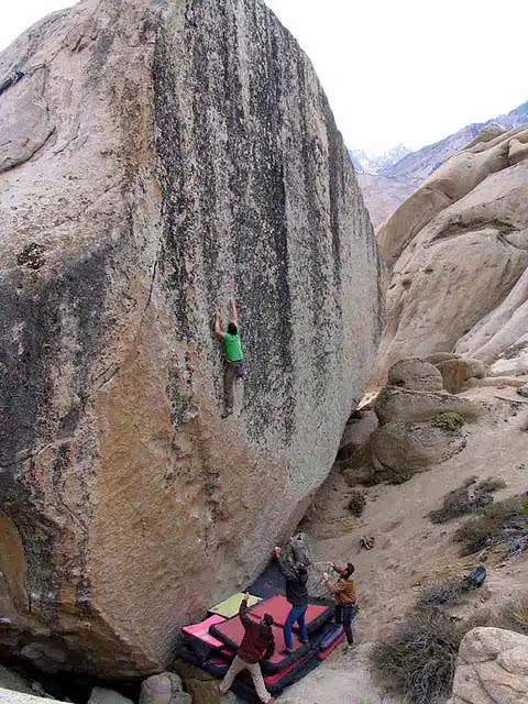 climber on big boulder