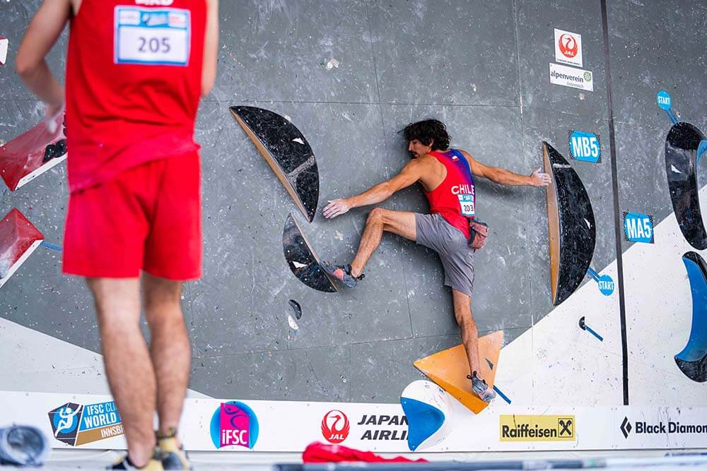 climber bouldering in competition