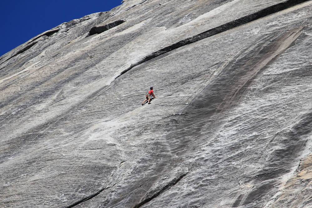 climber free soloing in yosemite