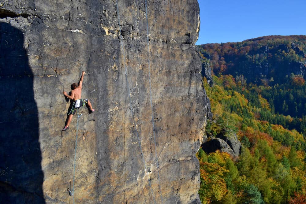 man sport climbing in switzerland