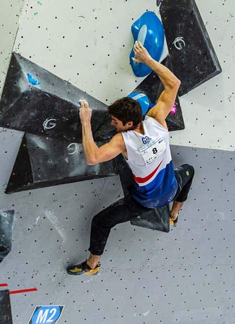 competition climber using gaston