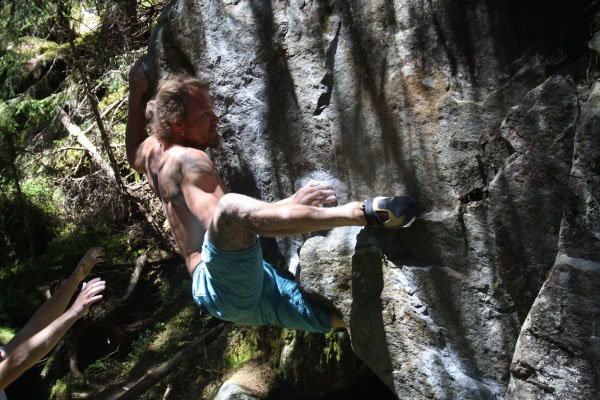 climber using a high right heel hook