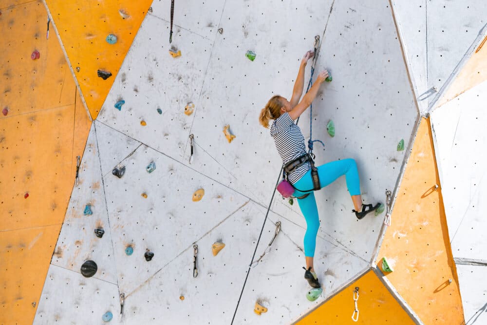 woman training endurance for climbing indoors